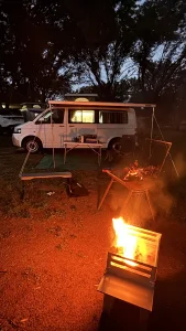 VanTom. Unique design where the pop-top is in the middle
Of the van where you can stand up in the kitchen area.